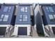 Stylish townhome exterior with private garage entrances and well-maintained landscaping at 1570 Flat Shoals Se Rd # 4, Atlanta, GA 30316
