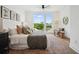Serene bedroom with a large window offering natural light and a view of the outdoors at 1570 Flat Shoals Se Rd # 4, Atlanta, GA 30316