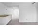 Unfinished bonus room with carpet flooring, and a kitchenette at 3073 Henderson Mill Rd, Atlanta, GA 30341
