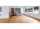 Bright living room featuring hardwood floors, a large window, and neutral colors at 3073 Henderson Mill Rd, Atlanta, GA 30341