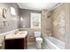 Bathroom featuring a tub shower, tile flooring, and updated fixtures at 3097 Sycamore Ln, Marietta, GA 30066