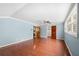 Spacious bedroom with natural light, ceiling fan and lustrous hardwood floors at 3097 Sycamore Ln, Marietta, GA 30066