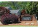 Oak Creek Estates community entrance sign surrounded by landscaping and trees at 3097 Sycamore Ln, Marietta, GA 30066