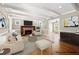 Bright living room featuring a stone fireplace, hardwood floors, neutral walls, and recessed lighting at 3097 Sycamore Ln, Marietta, GA 30066
