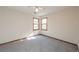 Cozy bedroom with two windows and neutral walls, offering a serene and relaxing atmosphere at 3684 Wittenburg Ct, Decatur, GA 30034