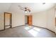 Bedroom with neutral walls, a ceiling fan, and natural light, great for relaxation and rest at 3684 Wittenburg Ct, Decatur, GA 30034