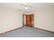 Bedroom with a ceiling fan and a closet for ample storage, blending comfort and functionality at 3684 Wittenburg Ct, Decatur, GA 30034