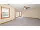 Spacious bedroom with large windows and a ceiling fan, providing ample natural light at 3684 Wittenburg Ct, Decatur, GA 30034