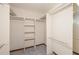 Walk-in closet with built-in shelving and ample storage space, ready for organization at 3684 Wittenburg Ct, Decatur, GA 30034