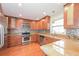 Modern kitchen featuring stainless steel appliances and granite countertops at 3684 Wittenburg Ct, Decatur, GA 30034