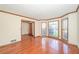 Bright living area with hardwood floors, large windows, and views to the front yard at 3684 Wittenburg Ct, Decatur, GA 30034