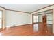 Open-concept living area featuring hardwood floors with lots of natural light at 3684 Wittenburg Ct, Decatur, GA 30034