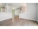 Open living room space with hardwood floors, neutral paint and natural light at 4490 Thornwood Trl, Stone Mountain, GA 30083