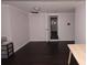 The basement is very spacious with hardwood flooring, neutrally painted walls, and ample lighting at 819 Venetta Nw Pl, Atlanta, GA 30318