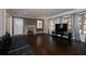 Bright living room features hardwood floors, a marble fireplace, and large windows at 819 Venetta Nw Pl, Atlanta, GA 30318