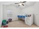 bedroom with a bunkbed, ceiling fan, and carpeted floors at 1895 Weston Ln, Tucker, GA 30084