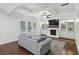 Cozy living room features custom built-ins, a fireplace, and hardwood floors at 1895 Weston Ln, Tucker, GA 30084