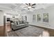Open-concept living space connects to the kitchen, offering ample natural light at 1895 Weston Ln, Tucker, GA 30084
