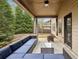 Covered patio with comfortable seating, perfect for outdoor entertaining and relaxation at 1895 Weston Ln, Tucker, GA 30084