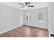 Bright bedroom featuring wood flooring, fresh paint and bright, natural light at 484 Lorene Sw Dr, Marietta, GA 30060