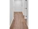 Hallway with wood floors that creates an inviting atmosphere and seamless transition between rooms at 484 Lorene Sw Dr, Marietta, GA 30060