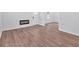 Inviting living room with elegant hardwood floors and a modern electric fireplace at 484 Lorene Sw Dr, Marietta, GA 30060