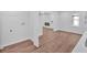Spacious room showcasing new wood flooring and a neutral color palette throughout at 484 Lorene Sw Dr, Marietta, GA 30060