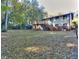 Large backyard with deck and patio, perfect for outdoor entertaining and relaxation at 921 Creekdale Dr, Clarkston, GA 30021