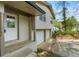 Charming home featuring a covered porch, and a two-car garage blending comfort and practicality seamlessly at 3309 Poplar Dr, Lawrenceville, GA 30044