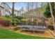 Backyard featuring a trampoline at 4155 Summit Gate Dr, Suwanee, GA 30024