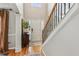 Inviting home entrance with hardwood floors, decorative accents, and bright natural light at 4155 Summit Gate Dr, Suwanee, GA 30024