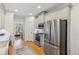 Efficient kitchen with stainless steel appliances and ample cabinet space at 4155 Summit Gate Dr, Suwanee, GA 30024