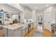 Stylish kitchen with stainless steel appliances and a seamless flow to the living area at 4155 Summit Gate Dr, Suwanee, GA 30024