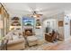 Inviting living room featuring a cozy fireplace and custom built-in shelving at 4155 Summit Gate Dr, Suwanee, GA 30024