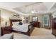 Spacious main bedroom with tray ceiling, plush carpet, and ample natural light at 4155 Summit Gate Dr, Suwanee, GA 30024