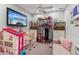 Playroom featuring toys, TV, mini table and chairs at 4155 Summit Gate Dr, Suwanee, GA 30024