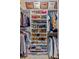 Organized walk-in closet with custom shelving and plenty of storage space at 4155 Summit Gate Dr, Suwanee, GA 30024