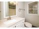 Cozy bathroom featuring a large vanity, modern sink, and toilet at 5798 Salem Rd, Covington, GA 30016