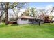 Well-maintained home exterior showcasing the landscaped yard and inviting curb appeal at 5798 Salem Rd, Covington, GA 30016