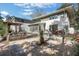Extensive backyard with stone patio, dining area and a beautiful garden, perfect for relaxing and entertaining at 1211 Oakdale Ne Rd, Atlanta, GA 30307