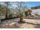 Landscaped backyard with a stone patio, perfect for outdoor relaxation and entertaining at 1211 Oakdale Ne Rd, Atlanta, GA 30307
