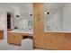 Bright bathroom features double vanity, marble counters, and white tile floor at 1211 Oakdale Ne Rd, Atlanta, GA 30307