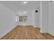 Bright bedroom featuring hardwood floors, a window, and a closet for ample storage at 1211 Oakdale Ne Rd, Atlanta, GA 30307