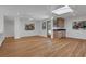Bonus room features hardwood floors, wet bar, natural light, and art at 1211 Oakdale Ne Rd, Atlanta, GA 30307