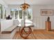Cozy breakfast nook with a window seat, hardwood floors, and modern lighting at 1211 Oakdale Ne Rd, Atlanta, GA 30307