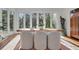 Dining room with large windows providing natural light and elegant decor at 1211 Oakdale Ne Rd, Atlanta, GA 30307