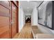 Hallway featuring hardwood floors, recessed lighting, and decorative artwork at 1211 Oakdale Ne Rd, Atlanta, GA 30307