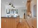 Updated kitchen featuring granite countertops, modern lighting, and hardwood floors at 1211 Oakdale Ne Rd, Atlanta, GA 30307