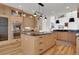 Stylish kitchen with an island, built-in appliances, hardwood floors, and granite countertops at 1211 Oakdale Ne Rd, Atlanta, GA 30307