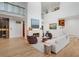 Bright living room with hardwood floors, fireplace, modern furnishings, and access to a wine cellar at 1211 Oakdale Ne Rd, Atlanta, GA 30307